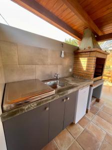 Kuchyň nebo kuchyňský kout v ubytování La Casita del Mojino