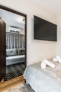 Postel nebo postele na pokoji v ubytování Aparthome Tatra