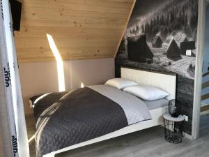 Łóżko lub łóżka w pokoju w obiekcie Domek Góralski Kąty na Wierchu