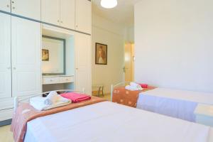 A bed or beds in a room at Villa Joanna