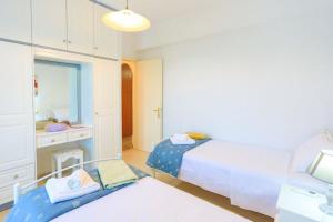 A bed or beds in a room at Villa Joanna
