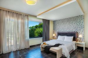 Posteľ alebo postele v izbe v ubytovaní Sunny Villa Grande + 18 fotografií