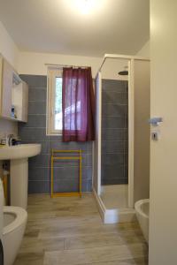 a bathroom with a shower and a sink at Sérémont 534 in Charvensod