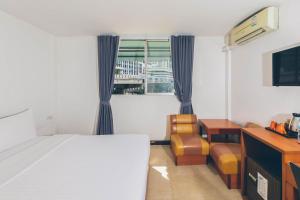 Postel nebo postele na pokoji v ubytování Atlas Bangkok Hotel