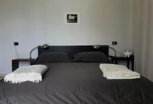 Posteľ alebo postele v izbe v ubytovaní VILLA AS Campo Marzio