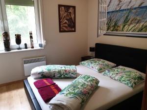 Posteľ alebo postele v izbe v ubytovaní Apartament Maria