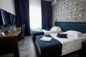 Voodi või voodid majutusasutuse Vila Iris toas