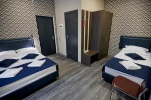 Voodi või voodid majutusasutuse Vila Iris toas