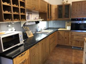 Kuchyň nebo kuchyňský kout v ubytování Dom Tkacki - Apartamenty - Pokoje - Jacuzzi