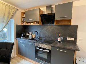 Kuchyň nebo kuchyňský kout v ubytování Ferienwohnung Nordsauerland