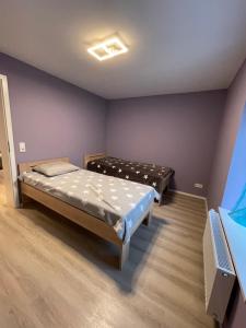 Postel nebo postele na pokoji v ubytování Ferienwohnung Nordsauerland