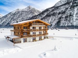 NATURPARKGUT - alpdeluxe Apartments v zime