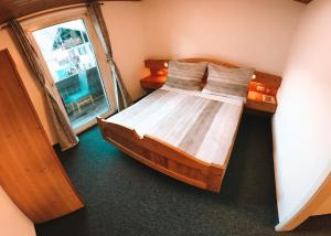 Postel nebo postele na pokoji v ubytování Green Natural Motel