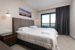 Postel nebo postele na pokoji v ubytování Tesoro Hotel Zakynthos