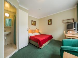 Voodi või voodid majutusasutuse Arabella Hotel toas