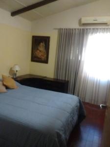 Postel nebo postele na pokoji v ubytování Casa Barrio Residencial II