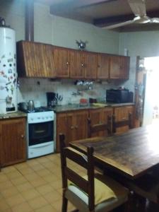 Kuchyň nebo kuchyňský kout v ubytování Casa Barrio Residencial II