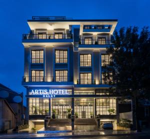 a building with a sign that readsarts hotel park at ARTIS Hotel Da Lat in Da Lat
