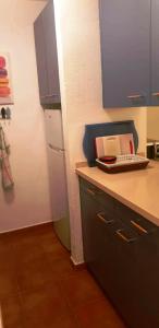 A kitchen or kitchenette at Apartment with large relax terrace and top equipment