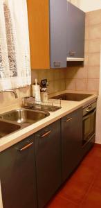 A kitchen or kitchenette at Apartment with large relax terrace and top equipment