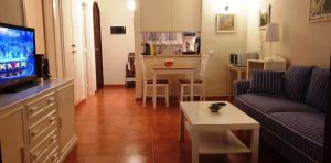 A television and/or entertainment centre at Apartment with large relax terrace and top equipment