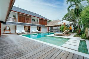 an image of a villa with a swimming pool at Vienna Villas in Seminyak