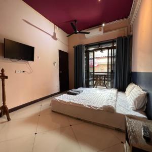 Postel nebo postele na pokoji v ubytování Madera House Chiang Mai