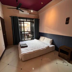 Postel nebo postele na pokoji v ubytování Madera House Chiang Mai