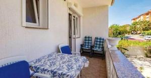 Balkón nebo terasa v ubytování Comfortable apartment with garden in Palit, 100 m², for 6 guests.