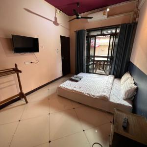 Postel nebo postele na pokoji v ubytování Madera House Chiang Mai