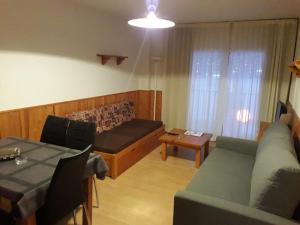 Et opholdsområde på Apartamentos Madriu Sherpa