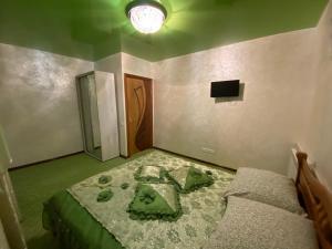 A bed or beds in a room at Plavianska Sadyba
