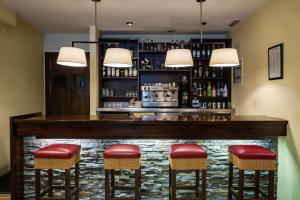 The lounge or bar area at Hotel Valle De Izas