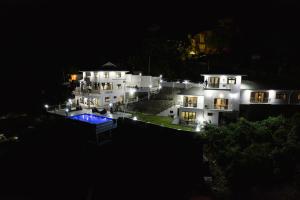 an aerial view of a house at night at Maison L'Horizon in De Quincey Village