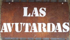 Um certificado, prêmio, placa ou outro documento exibido em Las Avutardas Hosteria