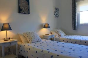 Postel nebo postele na pokoji v ubytování Villa Soraya Faro Park + 9 fotografií