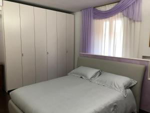 Posteľ alebo postele v izbe v ubytovaní Appartamento B&B Orizzonti