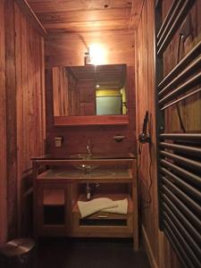 a bathroom with a sink and a mirror at Chalet Sempre Més in Font Romeu Odeillo Via +84 photos