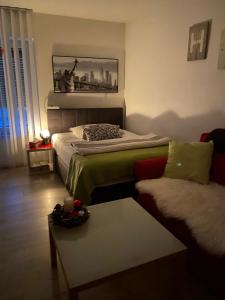 Postel nebo postele na pokoji v ubytování Apartment Friedrich 1201
