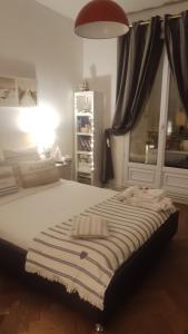 Katil atau katil-katil dalam bilik di Chambre au panier