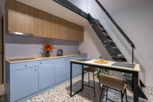 Kuchyň nebo kuchyňský kout v ubytování Spa & Pool - Studio Apartments 365