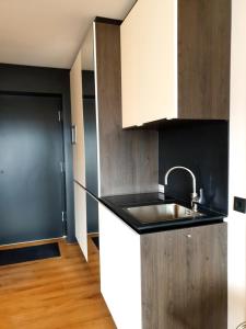 Kuchyň nebo kuchyňský kout v ubytování GAG Hotel by WMM Hotels