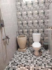 Koupelna v ubytování Mudhia Homestay