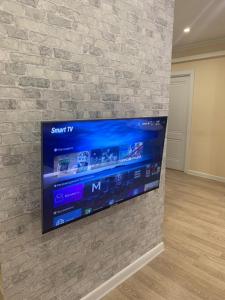 TV a/nebo společenská místnost v ubytování Art Apart 6 + 4 fotografie