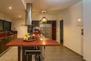 A kitchen or kitchenette at Villa Detoro