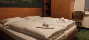 Posteľ alebo postele v izbe v ubytovaní Yako Apartment - Wagrain Center