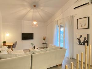 Un lugar para sentarse en Casa Brucie - New stylish apartment in Corfu!