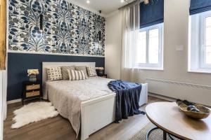 Posteľ alebo postele v izbe v ubytovaní Sweet Dream Apartman