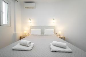 Posteľ alebo postele v izbe v ubytovaní Anius Apartments