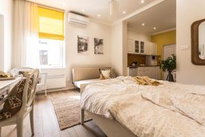 Posteľ alebo postele v izbe v ubytovaní Sweet Dream Apartman